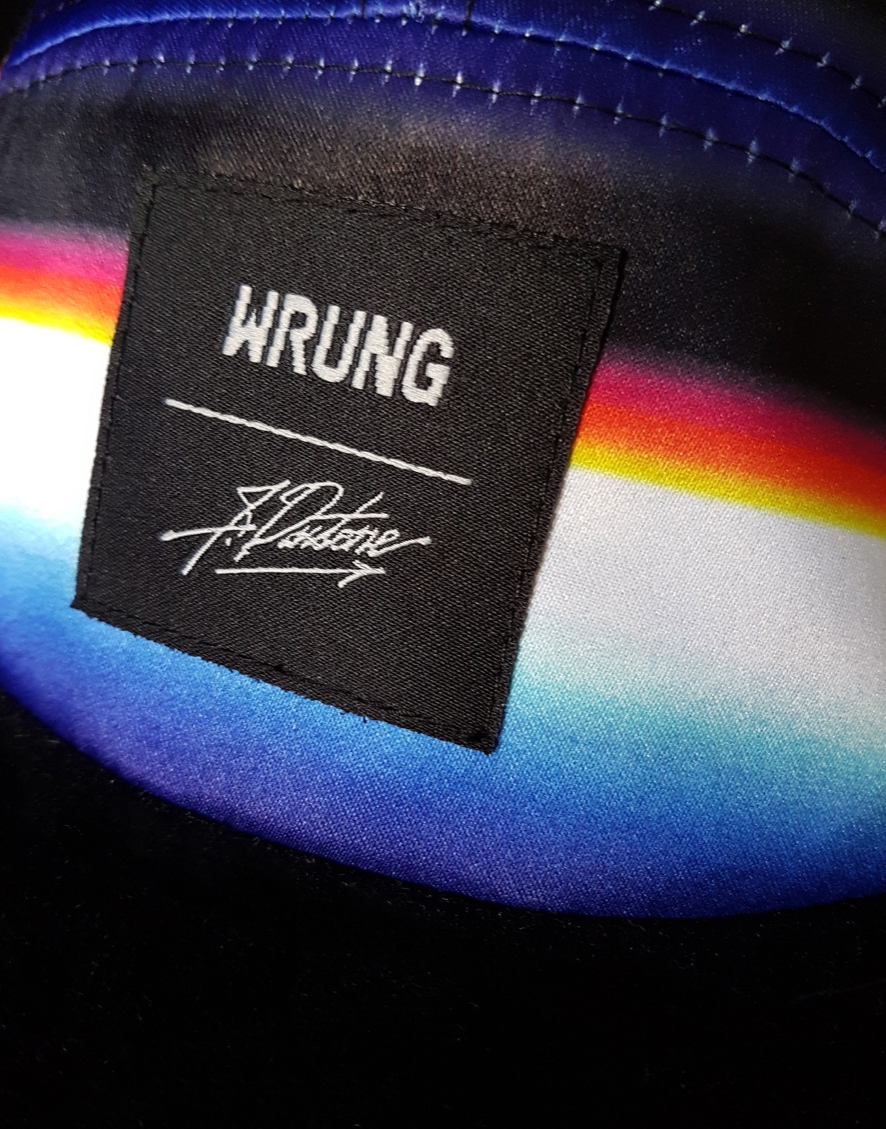 Wrung × Felipe Pantone — Gorra de cinco paneles — foto de prensa · prototipo local — clearance por imagen antes de publicar
