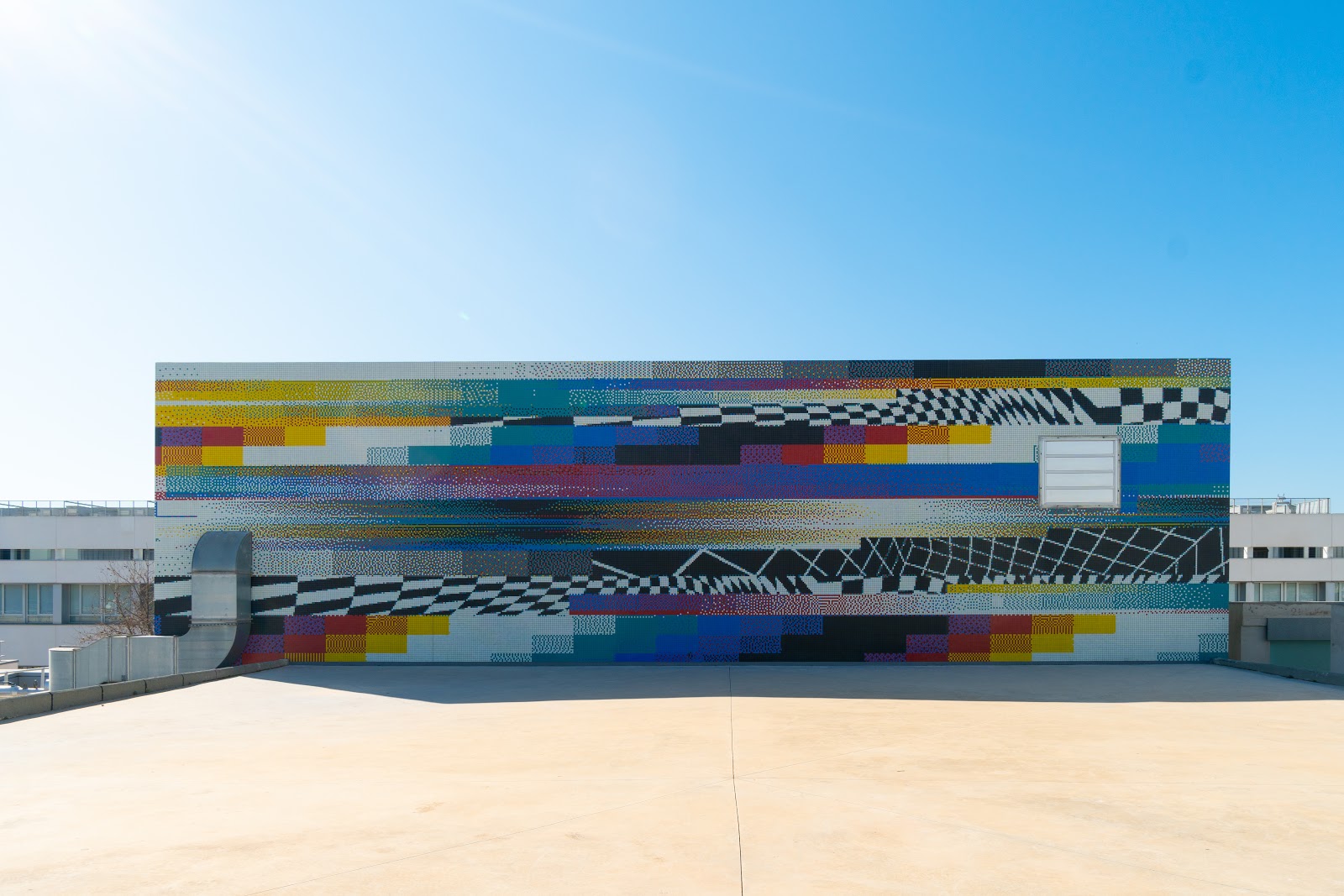 Chromadynamica (UPV mosaic facade), 2020 — foto del Drive del estudio (harvest 2026-07-04) · carpeta valencia-2020-upv-mosaic